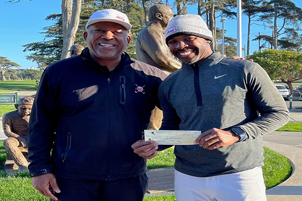 APGA Tour Executive Director Cole Smith presents the winner’s check to Tim O’Neal at TPC Harding Park. APGA Tour photo